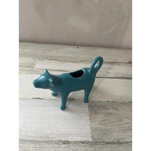 Small blue ceramic cow cream pitcher